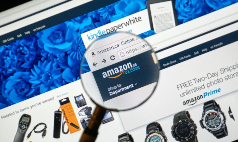 Amazon web page image with magnifying glass over logo